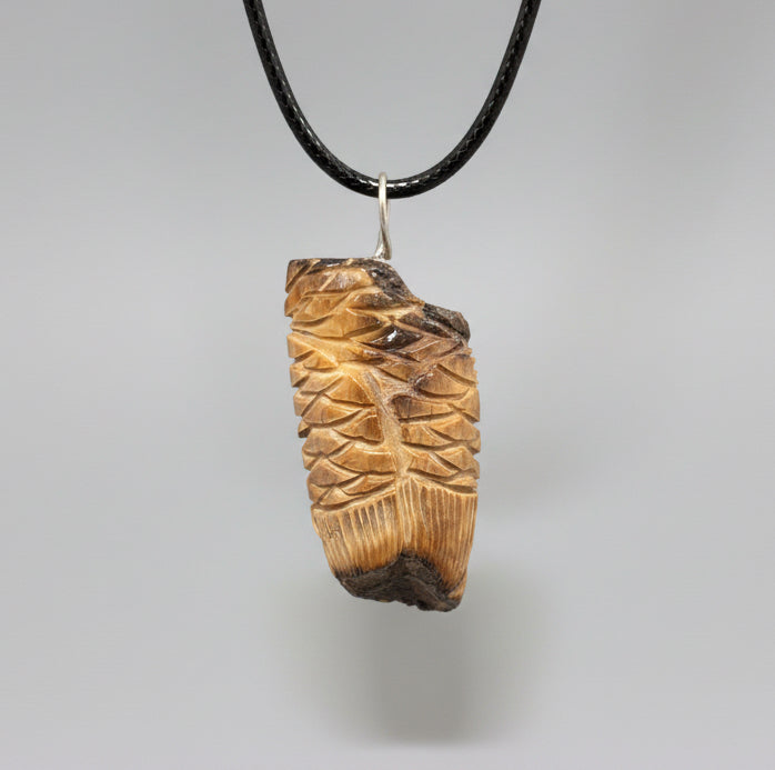 Fossilized Ivory Owl Pendant by Kateri Quandelacy Sanchez