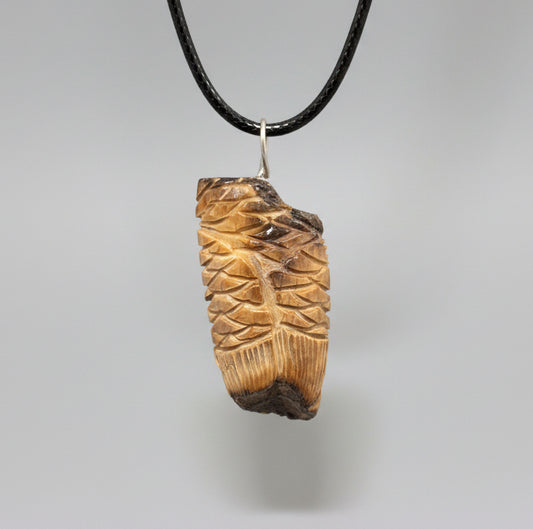 Fossilized Ivory Owl Pendant by Kateri Quandelacy Sanchez
